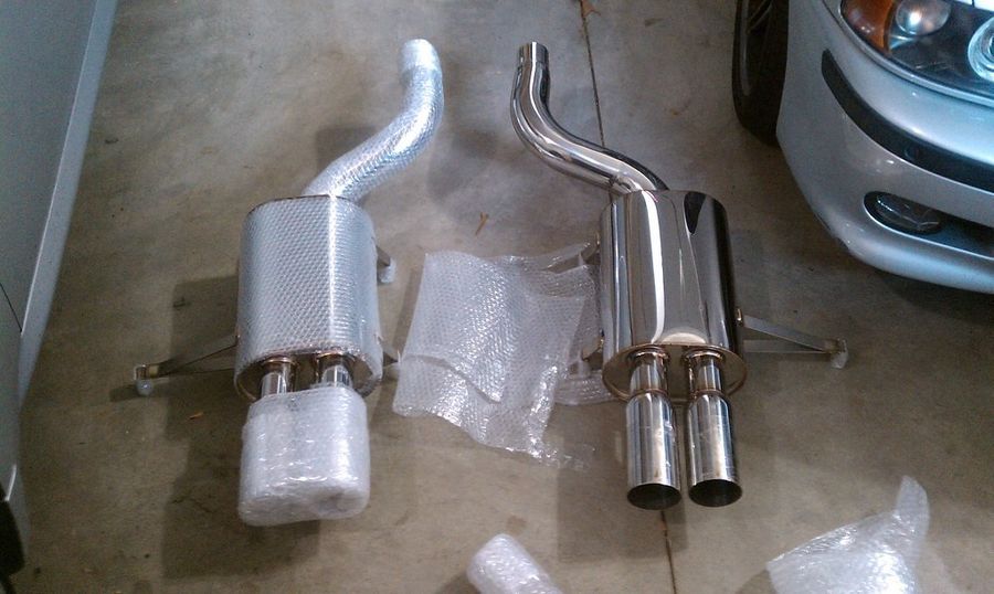 New mufflers ready for installation